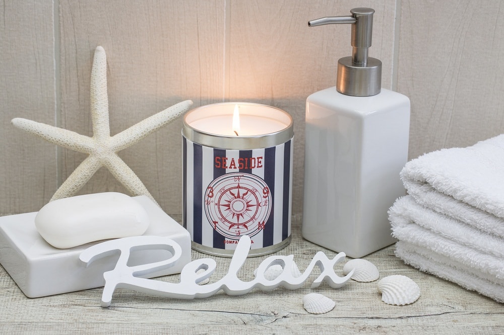 Nautical Candle, Soap, Towels Seashells and Wooden Word Relax Against Wall