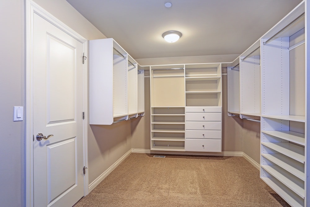 White Walk-In Closet with Shelves and Drawers